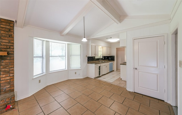 9104 Rosedown Cir, Shreveport, LA 71118 - kitchen featuring a sink, light tile patterned floors, white cabinetry, dishwasher, and backsplash