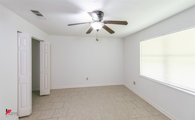 9104 Rosedown Cir, Shreveport, LA 71118 - empty room featuring a ceiling fan and baseboards
