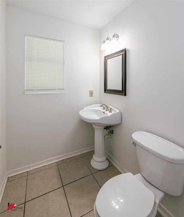 9104 Rosedown Cir, Shreveport, LA 71118 - half bath with toilet, tile patterned floors, and baseboards