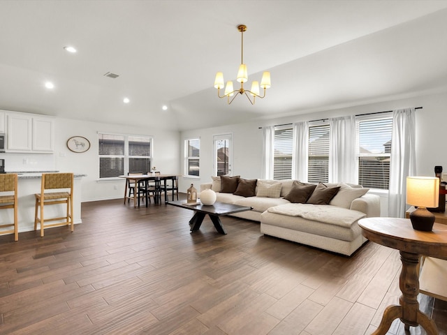 1519 Old Wichita Trl, Saginaw, TX 76131 - living room with a chandelier, dark wood finished floors, recessed lighting, and lofted ceiling
