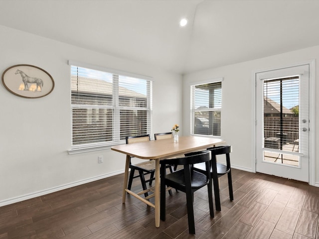 1519 Old Wichita Trl, Saginaw, TX 76131 - dining room featuring lofted ceiling, dark wood-style floors, and baseboards
