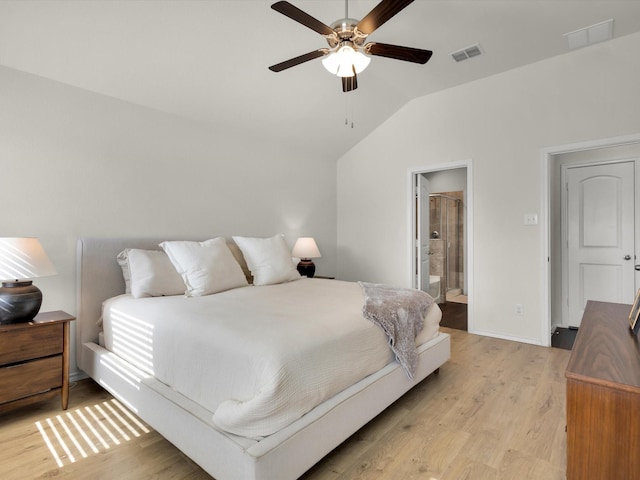 1519 Old Wichita Trl, Saginaw, TX 76131 - bedroom with vaulted ceiling, light wood finished floors, ensuite bath, baseboards, and ceiling fan