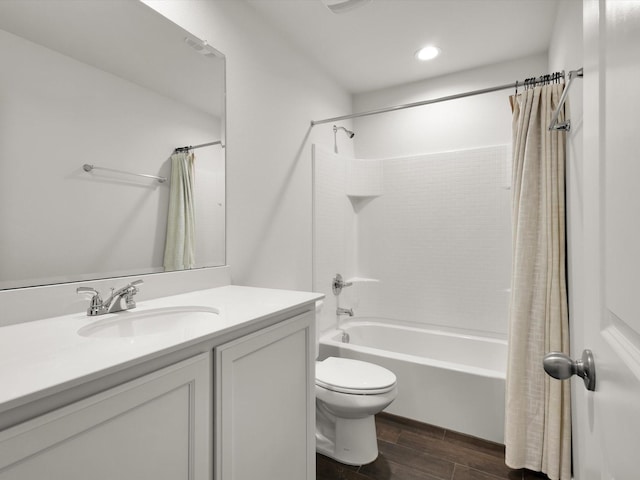 1519 Old Wichita Trl, Saginaw, TX 76131 - full bathroom with wood finished floors, shower / bathtub combination with curtain, toilet, vanity, and recessed lighting
