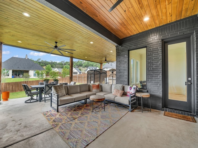 1117 Mountain View Dr, Weatherford, TX 76087 - fenced backyard with outdoor lounge area, a patio area, a ceiling fan, and outdoor dining area