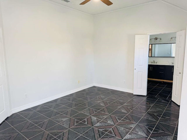 520 Timber Way Dr, Lewisville, TX 75067 - spare room featuring a ceiling fan, baseboards, crown molding, and a sink