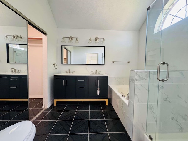 520 Timber Way Dr, Lewisville, TX 75067 - bathroom with lofted ceiling, a stall shower, a bath, double vanity, and tile patterned floors