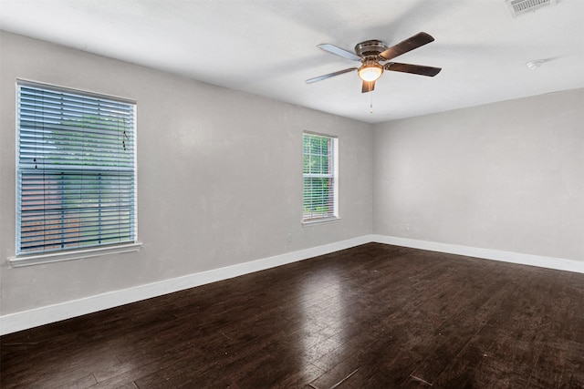 912 Thistle Cir, Allen, TX 75002 - spare room featuring dark wood-style flooring, baseboards, a ceiling fan, and a smoke detector