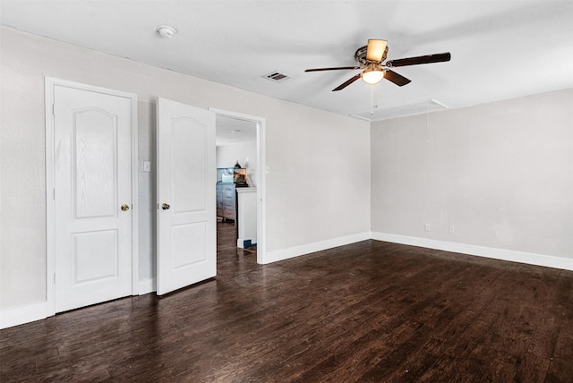 912 Thistle Cir, Allen, TX 75002 - empty room featuring attic access, ceiling fan, dark wood-type flooring, and baseboards