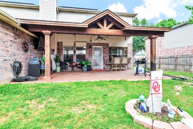 912 Thistle Cir, Allen, TX 75002 - back of house featuring a ceiling fan, a patio, and brick siding