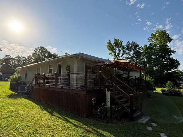 33 County Road 1131, Maud, TX 75567 - view of side of property featuring stairway, a gazebo, and a yard