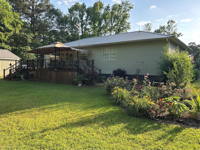 33 County Road 1131, Maud, TX 75567 - rear view of property with stairway, a gazebo, a lawn, and metal roof