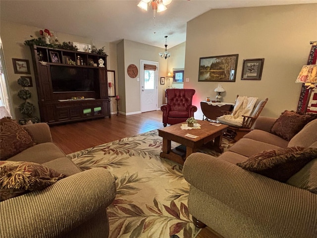 33 County Road 1131, Maud, TX 75567 - living area with wood finished floors, a ceiling fan, lofted ceiling, and baseboards