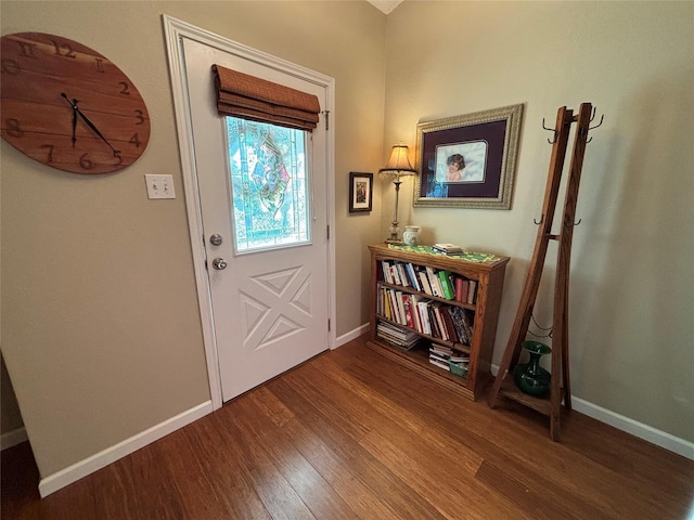 33 County Road 1131, Maud, TX 75567 - foyer entrance featuring wood finished floors and baseboards