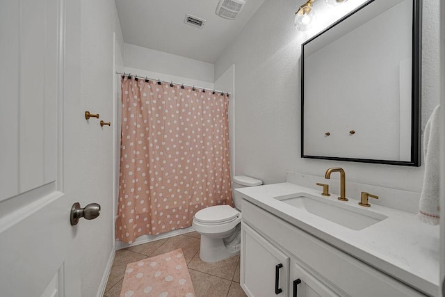 11701 Parade Dr, Frisco, TX 75036 - full bath featuring vanity, toilet, tile patterned floors, and curtained shower