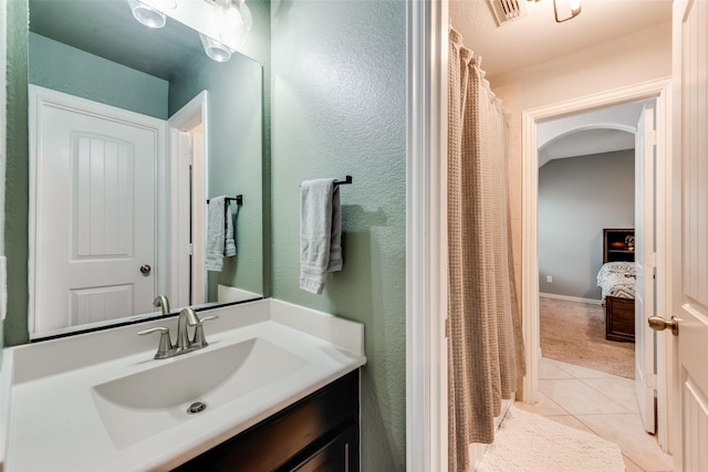 11701 Parade Dr, Frisco, TX 75036 - ensuite bathroom with tile patterned floors and vanity