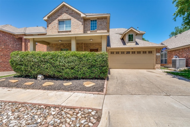 7812 Rancho De La Osa Trl, Mckinney, TX 75070 - view of front of property featuring brick siding, central AC unit, driveway, and a garage