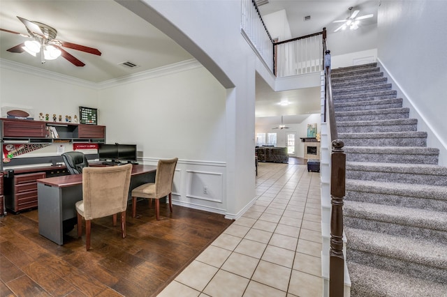 7812 Rancho De La Osa Trl, Mckinney, TX 75070 - office space with ceiling fan, arched walkways, crown molding, a towering ceiling, and wood finished floors