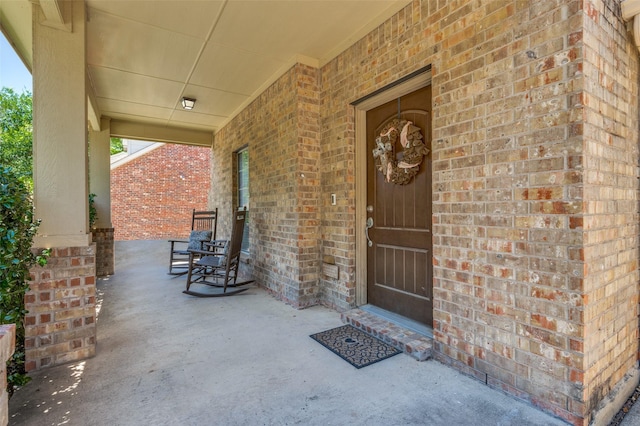 7812 Rancho De La Osa Trl, Mckinney, TX 75070 - entrance to property featuring brick siding and a porch