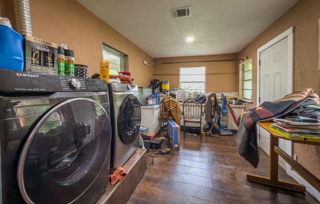 700 Magnolia St, Teague, TX 75860 - laundry room featuring separate washer and dryer and hardwood / wood-style flooring
