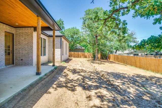 407 Baldwin Dr, Joshua, TX 76058 - fenced backyard with a patio