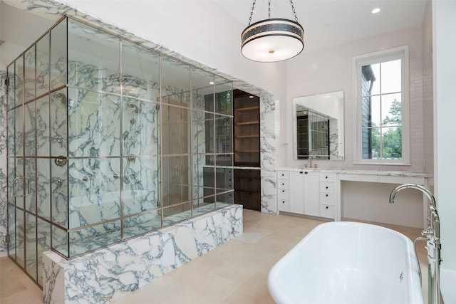 5531 Walnut Hill Ln, Dallas, TX 75229 - bathroom with a freestanding tub, vanity, a shower stall, and tile patterned floors