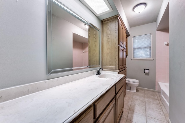2972 Maydelle Ln, Farmers Branch, TX 75234 - full bathroom featuring toilet, vanity, tile patterned flooring, and baseboards