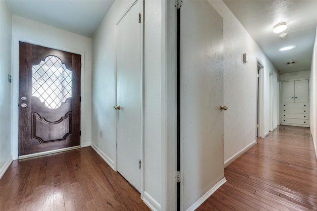 2972 Maydelle Ln, Farmers Branch, TX 75234 - foyer entrance with hardwood / wood-style flooring and baseboards