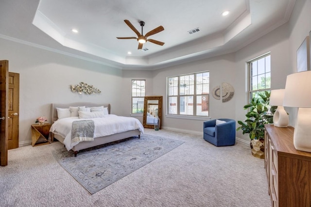 87 Eagle Chase Ln, Pottsboro, TX 75076 - carpeted bedroom with a raised ceiling, multiple windows, recessed lighting, ornamental molding, and baseboards