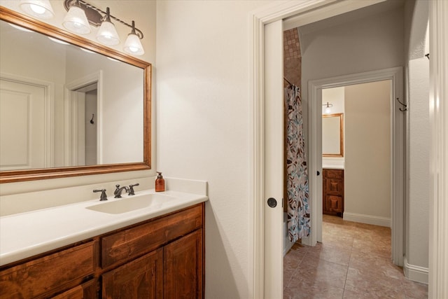 3712 Lonesome Creek Rd, Granbury, TX 76049 - full bathroom with vanity, a shower with shower curtain, and tile patterned floors
