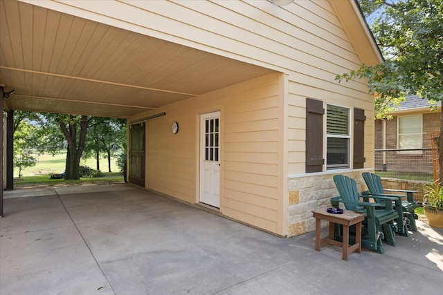3712 Lonesome Creek Rd, Granbury, TX 76049 - view of patio featuring a carport