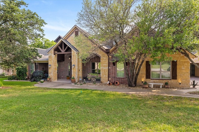 3712 Lonesome Creek Rd, Granbury, TX 76049 - view of front facade featuring a front lawn and brick siding