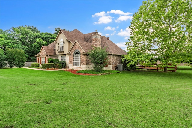 1621 Grandberry Dr, Melissa, TX 75454 - view of front of home with a chimney, brick siding, and roof with shingles