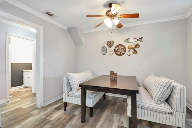 6505 Oakwood Lake Ct, Granbury, TX 76049 - dining area featuring light wood finished floors, crown molding, baseboards, and a ceiling fan