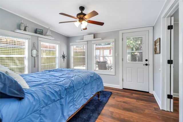 6505 Oakwood Lake Ct, Granbury, TX 76049 - bedroom featuring crown molding, dark wood finished floors, baseboards, a ceiling fan, and access to exterior