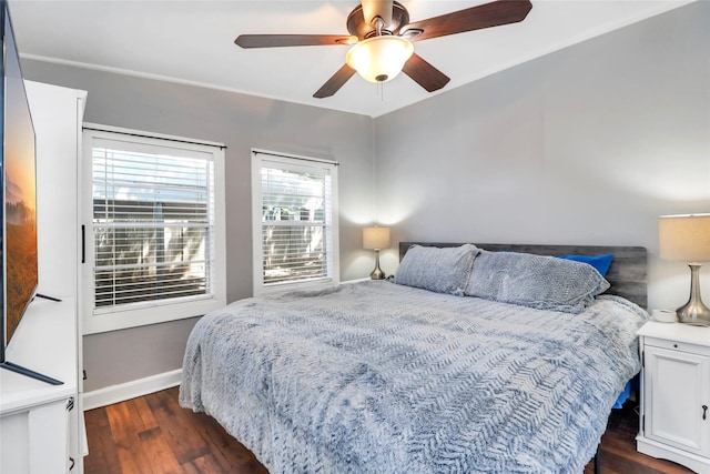 6505 Oakwood Lake Ct, Granbury, TX 76049 - bedroom featuring dark wood-type flooring, ceiling fan, and baseboards
