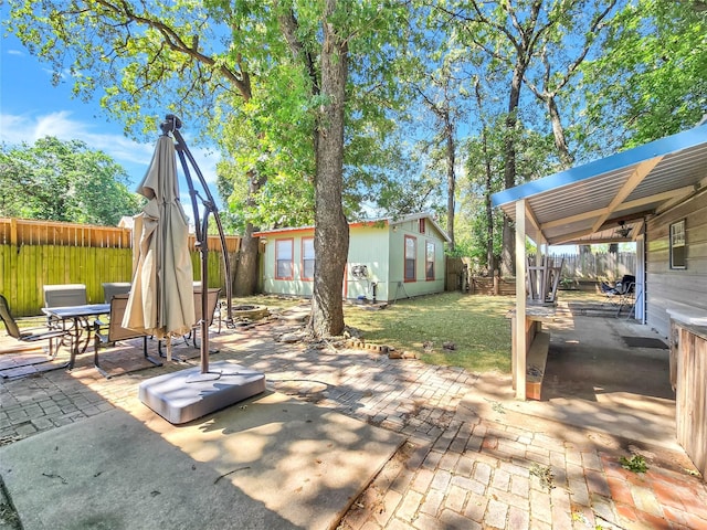 6505 Oakwood Lake Ct, Granbury, TX 76049 - view of patio / terrace with an outdoor structure
