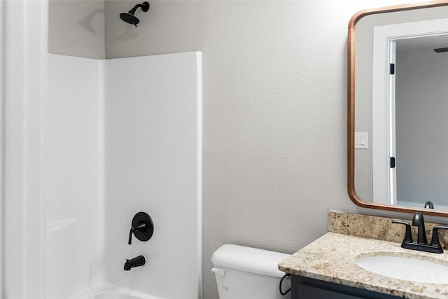 2404 Miller St, Denison, TX 75020 - full bath with toilet, vanity, and shower / tub combination