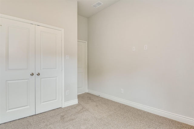500 Melody Cir, Kaufman, TX 75142 - unfurnished bedroom with carpet floors, a closet, and baseboards