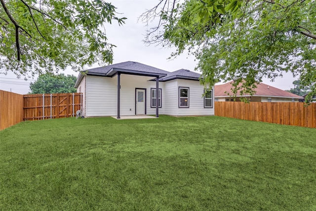 500 Melody Cir, Kaufman, TX 75142 - back of house with a patio area and roof with shingles