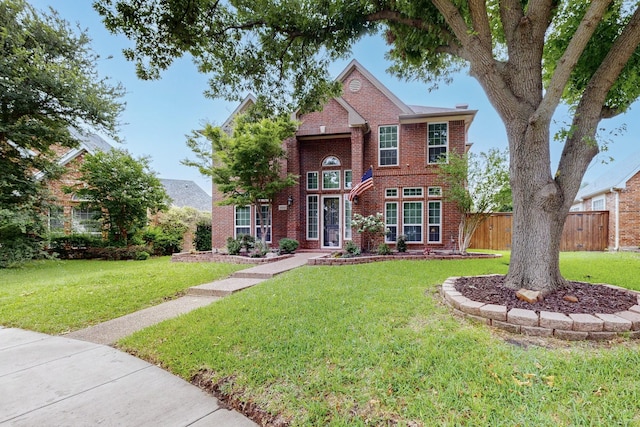 6916 Arvida Dr, Plano, TX 75023 - traditional home featuring brick siding
