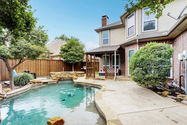 6916 Arvida Dr, Plano, TX 75023 - view of pool with a fenced backyard, a patio area, and a hot tub