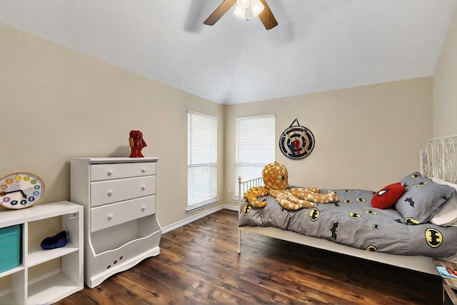 6916 Arvida Dr, Plano, TX 75023 - bedroom with dark wood-style flooring, lofted ceiling, baseboards, and ceiling fan