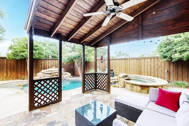6916 Arvida Dr, Plano, TX 75023 - fenced backyard featuring a ceiling fan, outdoor lounge area, a patio area, and an in-ground hot tub