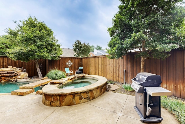 6916 Arvida Dr, Plano, TX 75023 - fenced backyard with an in-ground hot tub, a grill, and a patio area