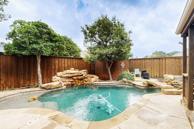 6916 Arvida Dr, Plano, TX 75023 - view of swimming pool with a fenced backyard