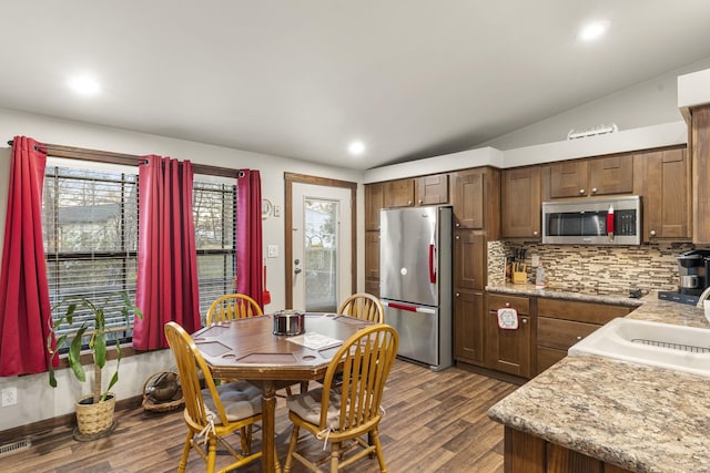 123 Little River Bnd, Mabank, TX 75156 - kitchen featuring stainless steel appliances, dark wood finished floors, backsplash, recessed lighting, and a sink