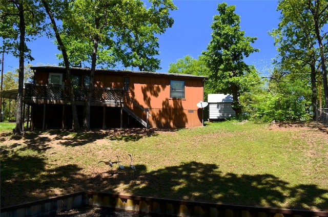 123 Little River Bnd, Mabank, TX 75156 - rear view of property with stairs, a wooden deck, and a yard