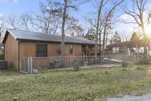 123 Little River Bnd, Mabank, TX 75156 - rear view of house featuring metal roof and central AC