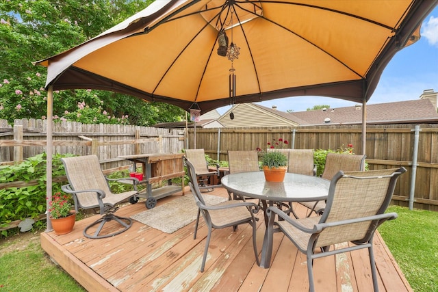 2302 Warwick Ave, Grand Prairie, TX 75052 - wooden deck featuring outdoor dining space and a fenced backyard