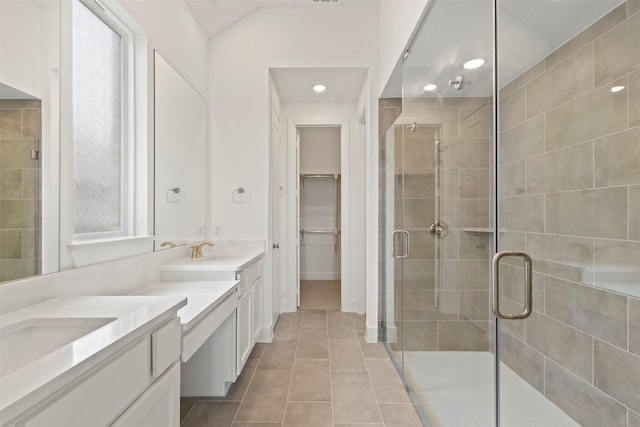 1812 Welker Dr, Van Alstyne, TX 75495 - full bathroom featuring a stall shower, two vanities, tile patterned floors, a spacious closet, and recessed lighting